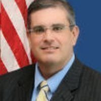 Official portrait of Dennis Perea
